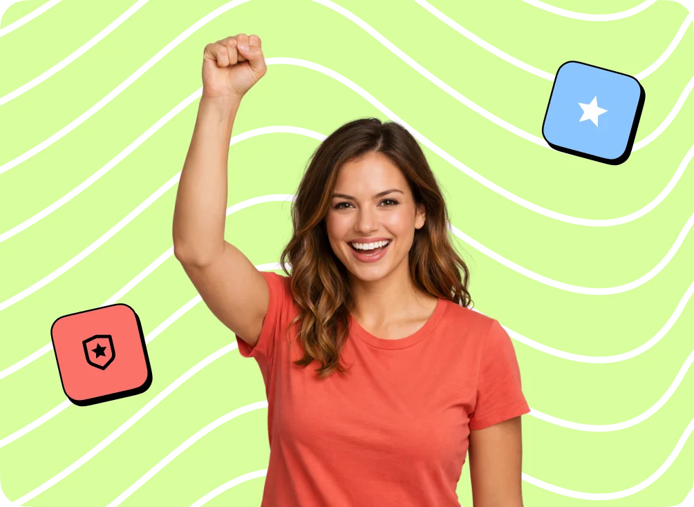 Smiling Narratologies team member raising her fist in celebration, representing the company’s core values and positive team culture.